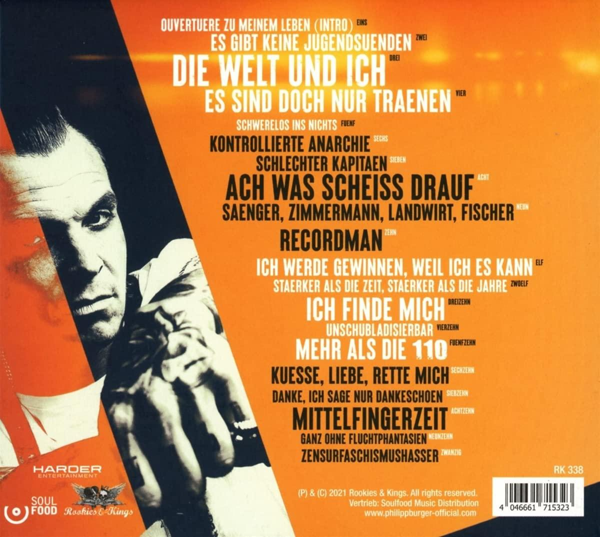 Albumcover mit einem Männergesicht, Text auf Deutsch. Rote und schwarze Farben dominieren.