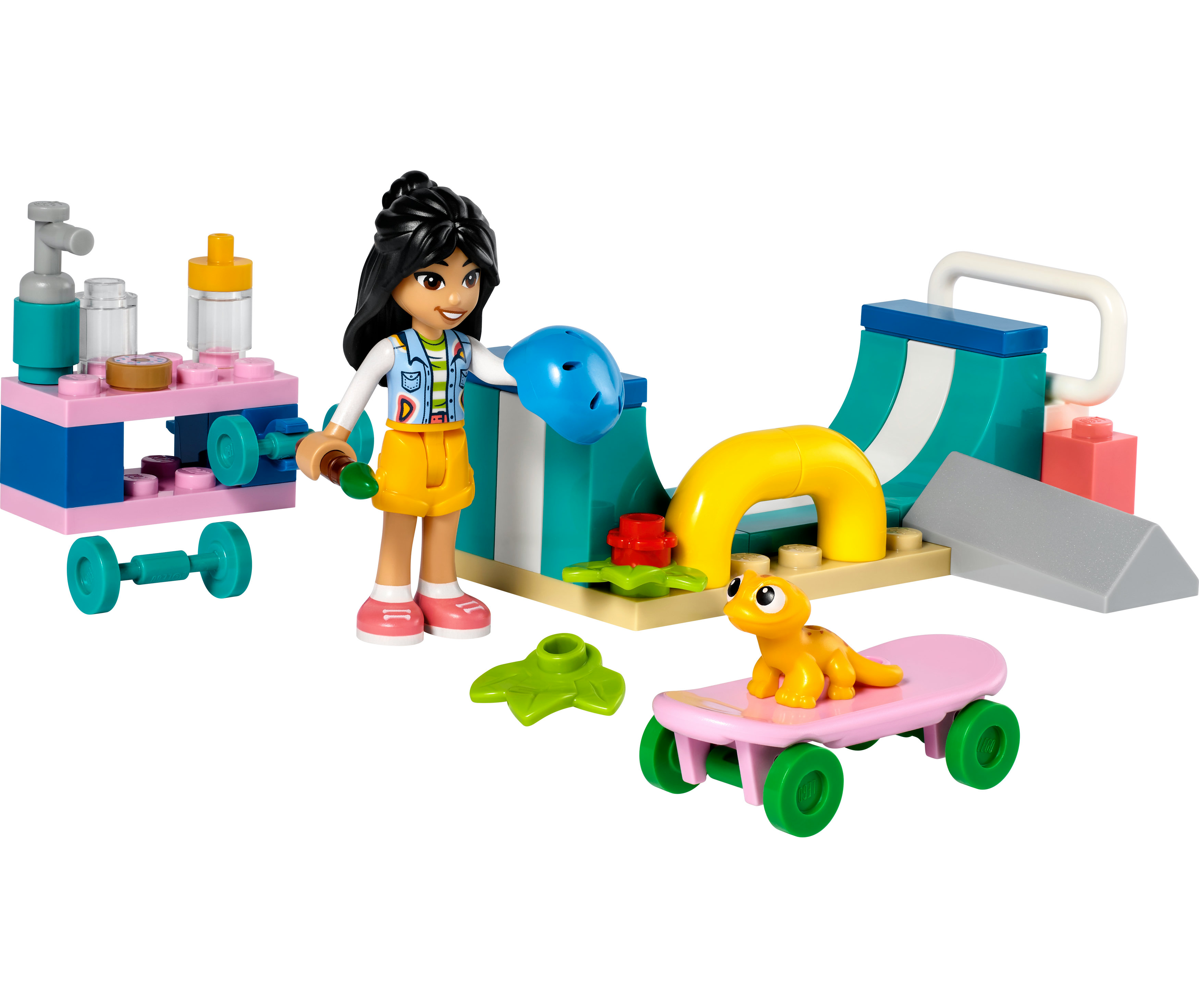 Ein LEGO-Set mit Mädchen, Skateboard und Rampe.