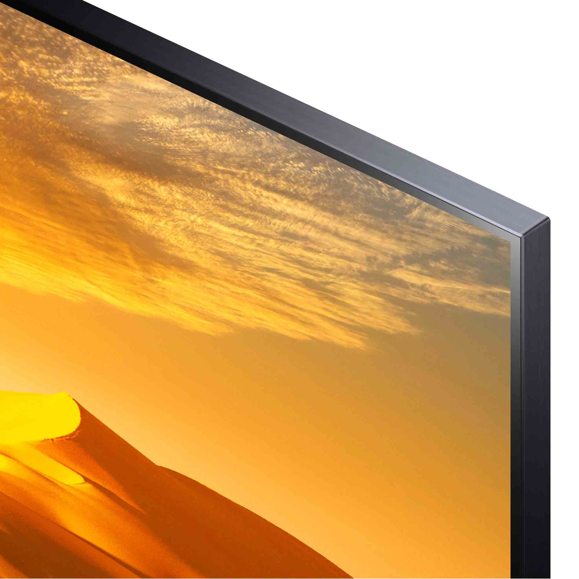 Un primer plano de una pantalla de TV con una imagen de puesta de sol, que muestra tonos amarillos y naranjas.