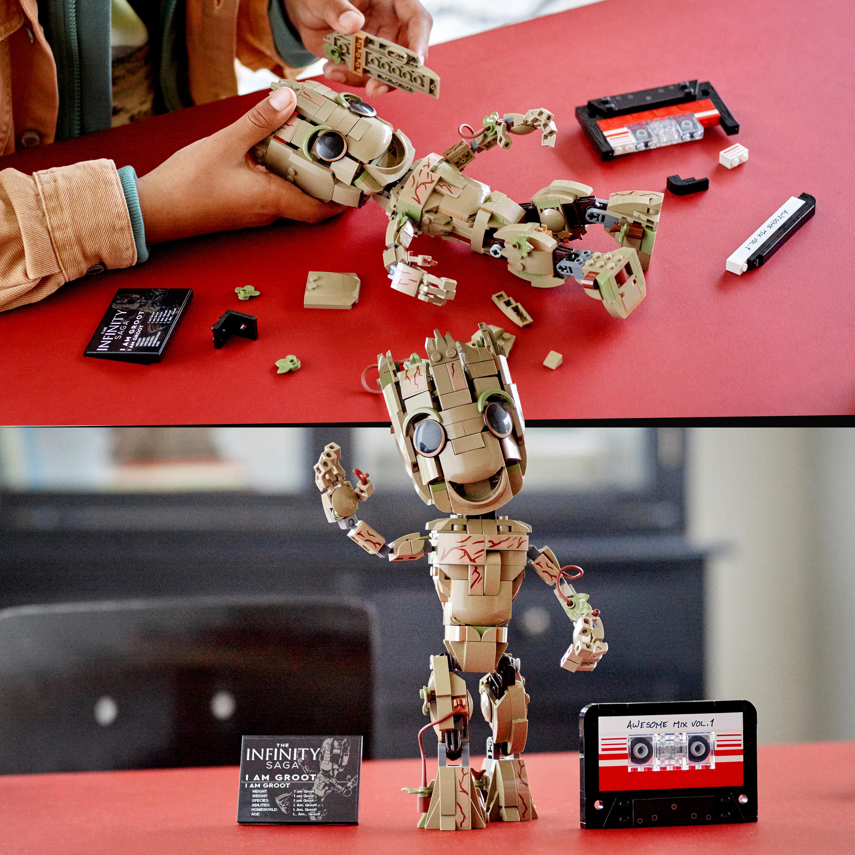 Lego Groot Modell mit anderen Lego Teilen auf roter Oberfläche.