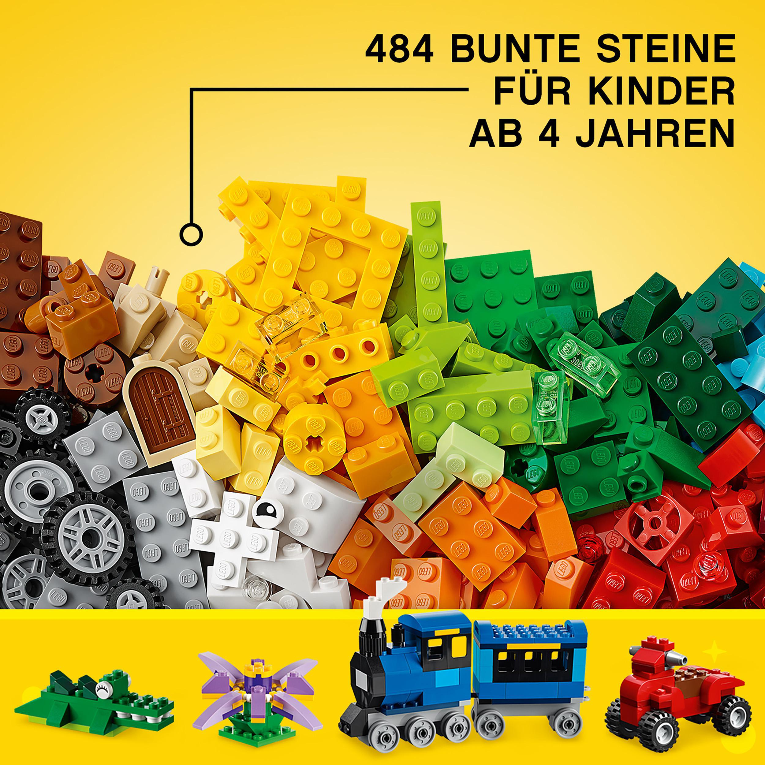 Lego-Steine in verschiedenen Farben und Größen, mit einigen Modellen von Zug, Dino und Auto.