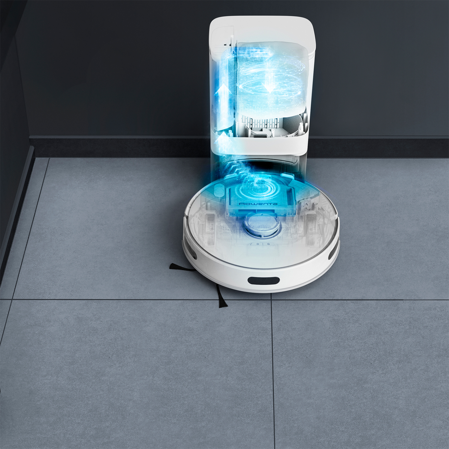 Aspirapolvere robot con stazione di ricarica, che mostra i suoi componenti interni.