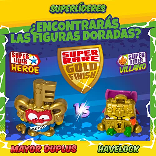 Dos juguetes dorados, uno una llave y el otro un cofre, con texto que dice 'Super Rare Gold Finish' y 'Mayor Duplus vs Havelock'.