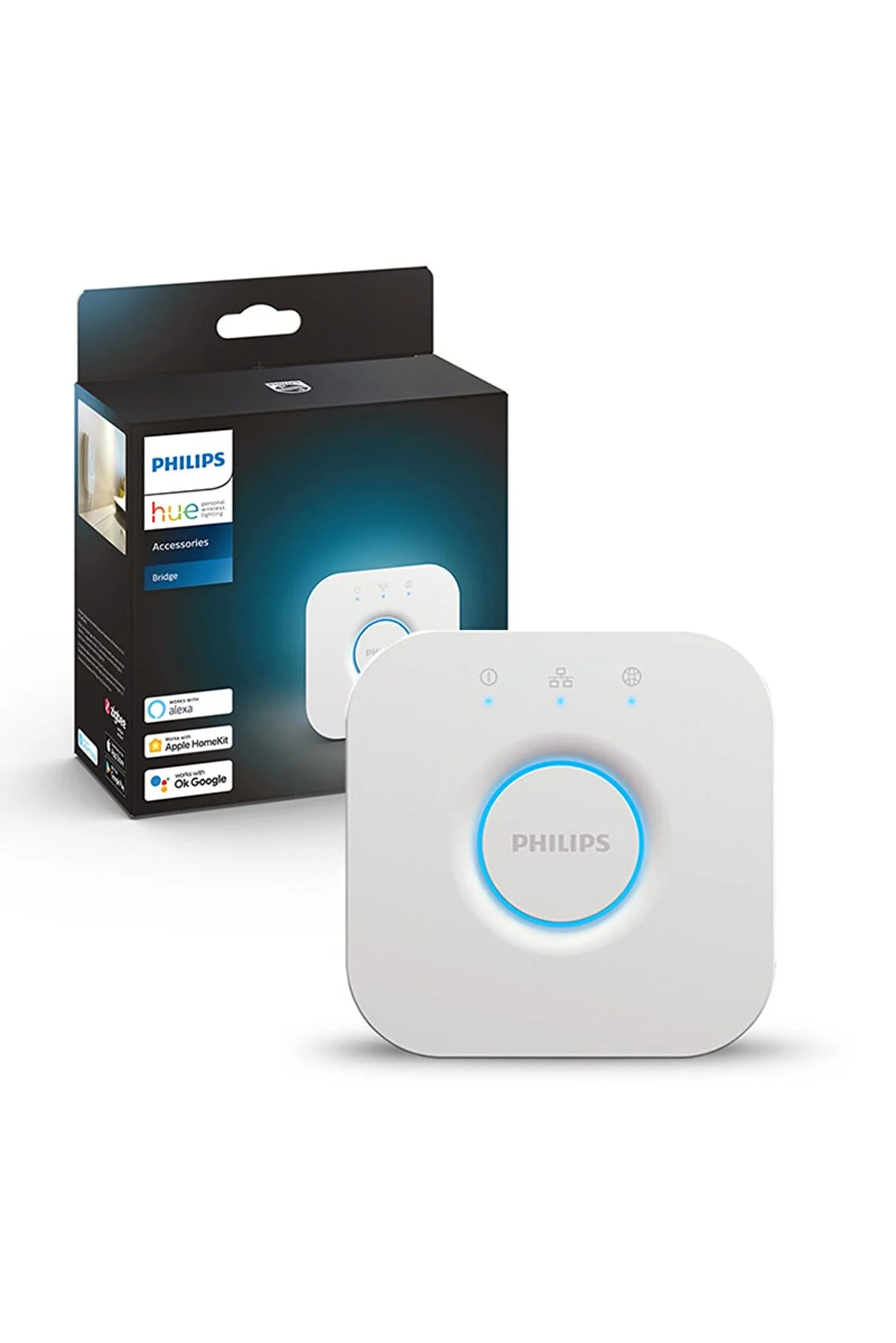 Beyaz Philips Hue Bridge cihazı ve kutusu. Her ikisinde de Philips logosu var. Kutu, metin içeren koyu renkli.