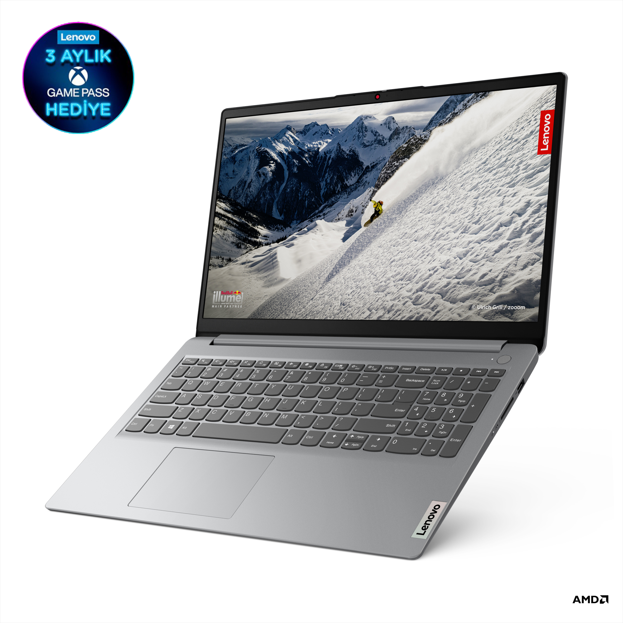 Bir Lenovo dizüstü bilgisayar, karla kaplı bir dağ manzarası ve bir klavye görüntülüyor.