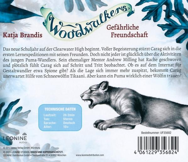 Buchcover mit dem Titel "Woodwalkers" und Bild eines Pumas.