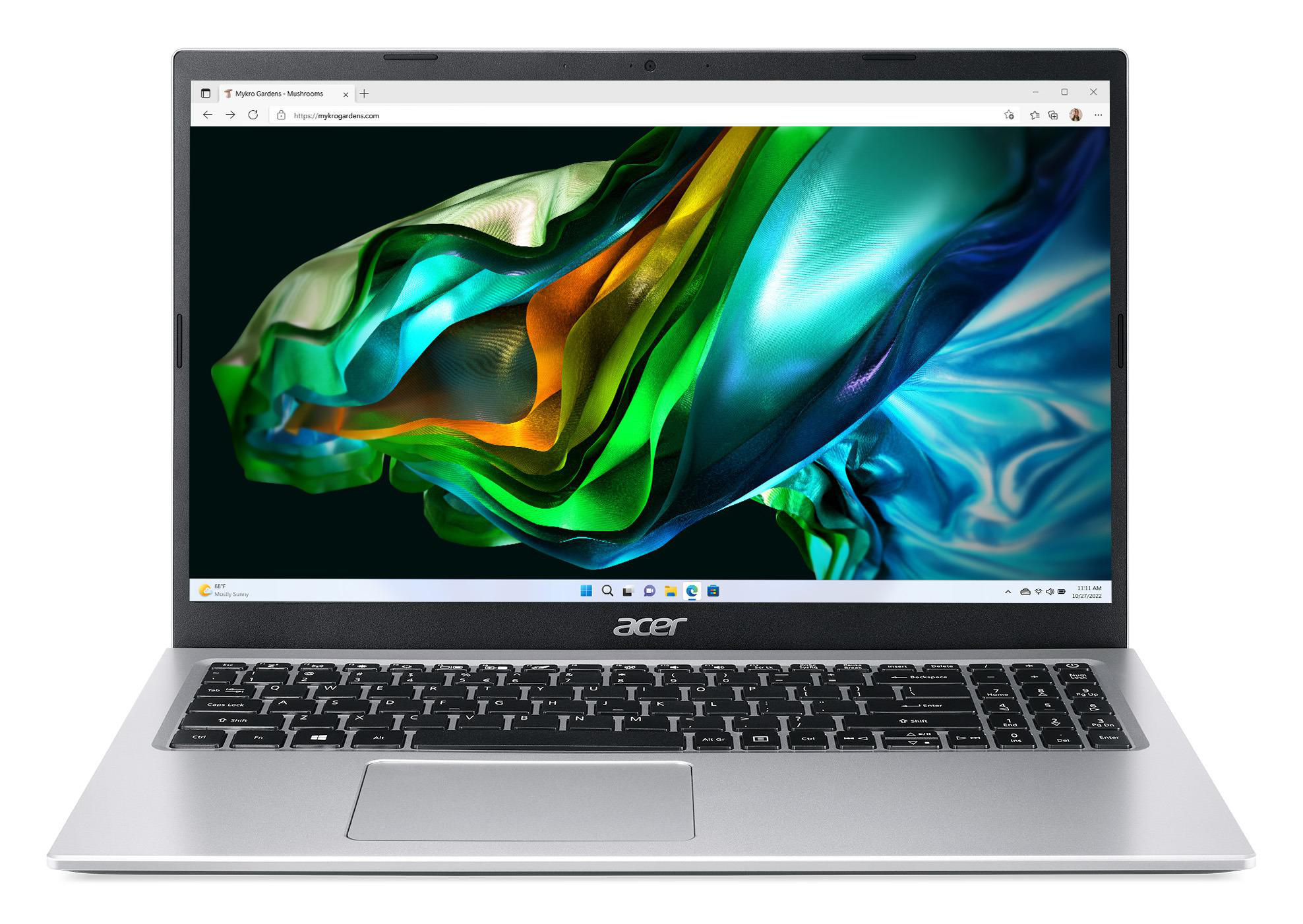 Ein silberner Laptop ist geöffnet und zeigt eine Webseite mit buntem Hintergrund.