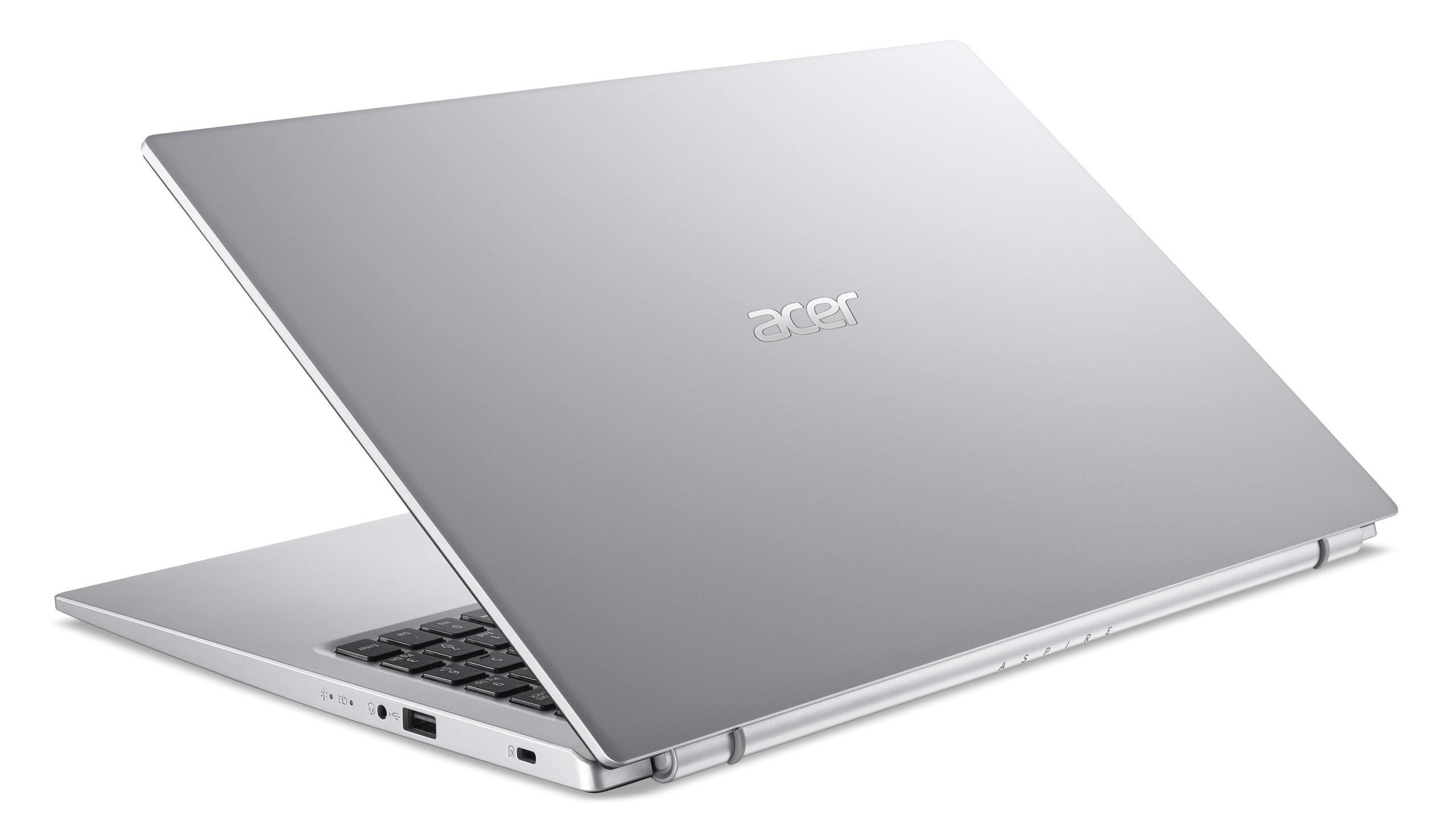 Ein silberner Laptop-Computer ist geöffnet, mit dem Rücken zur Kamera.