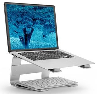 Laptop on a silver stand with a keyboard below. The screen displays a blue image.