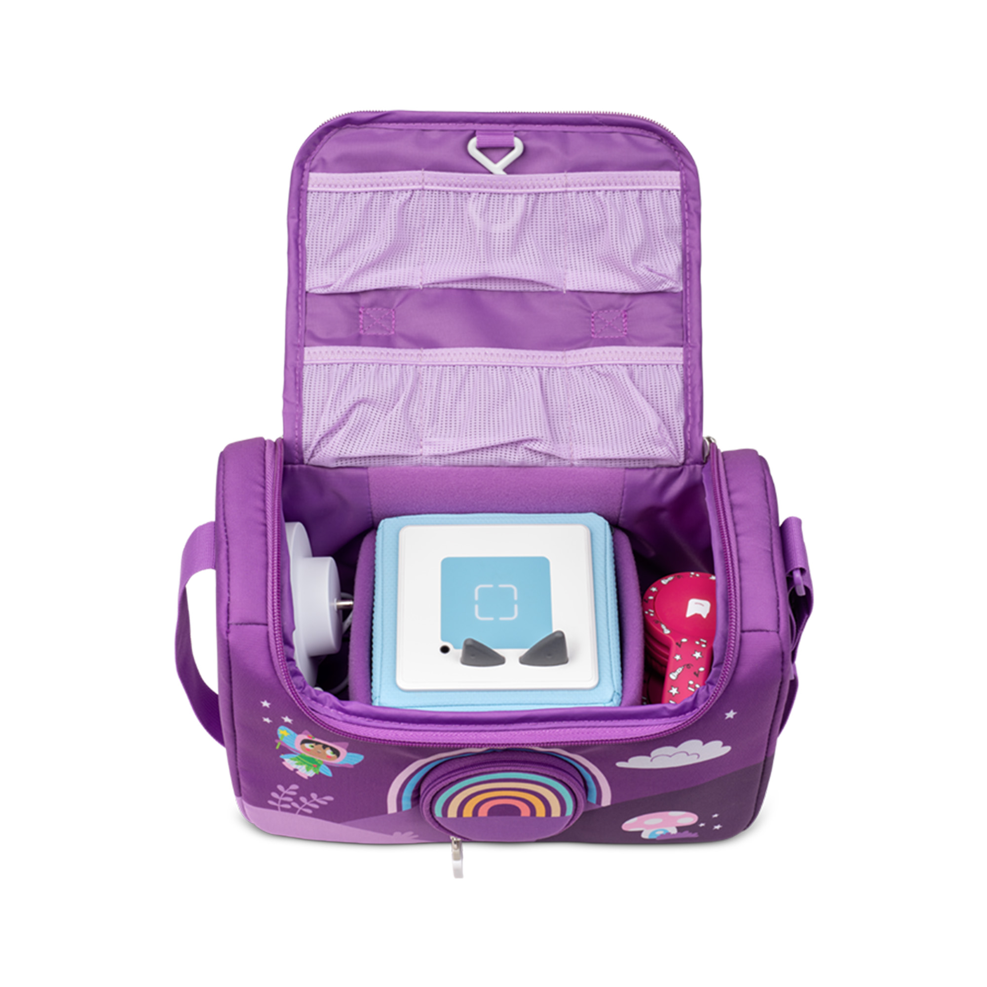 Eine lila Tasche mit einer blauen Box und anderem Spielzeug, mit Regenbogenmuster.