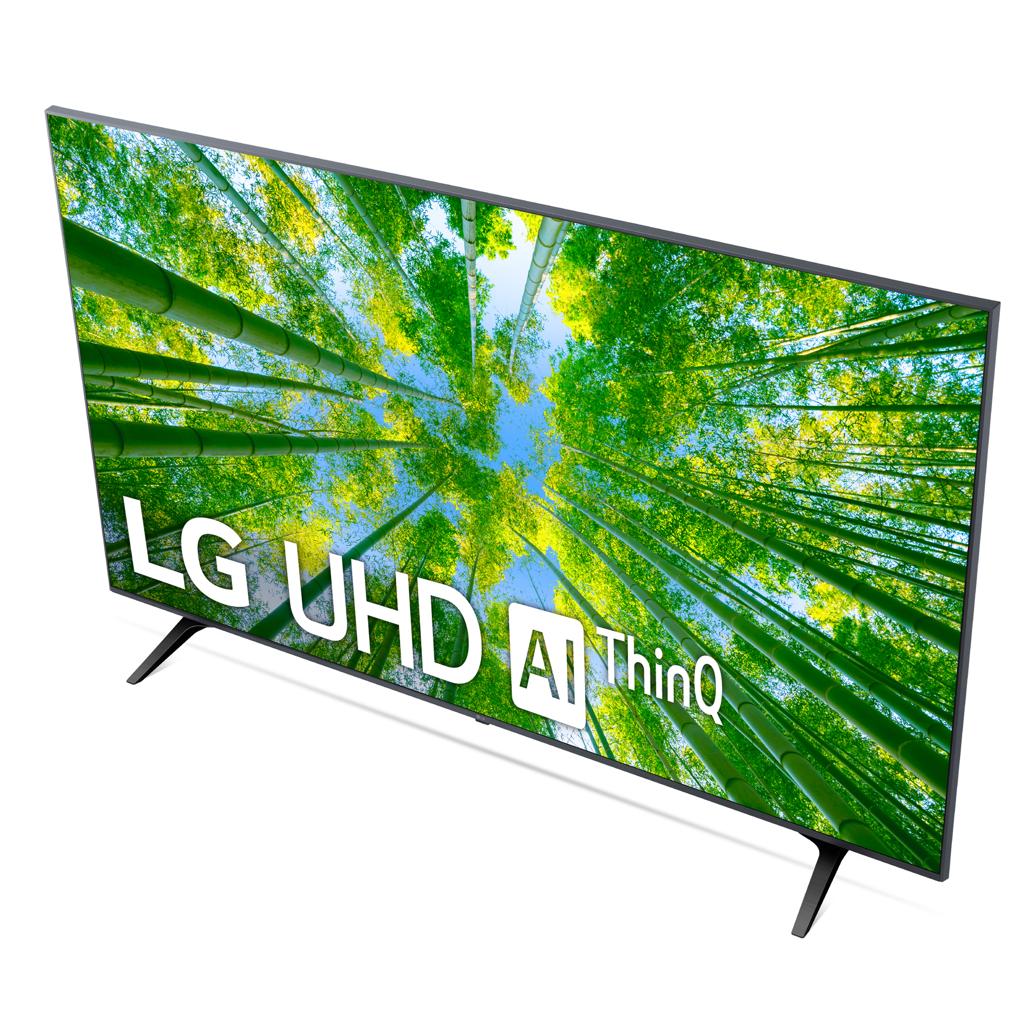 El televisor LG UHD muestra una escena de bosque de bambú. La pantalla tiene bordes negros y un soporte plateado.