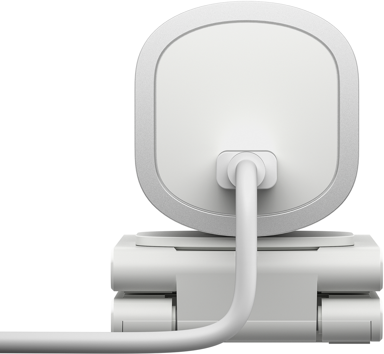 Rear view of a white security camera on a white surface, with a connecting cable.