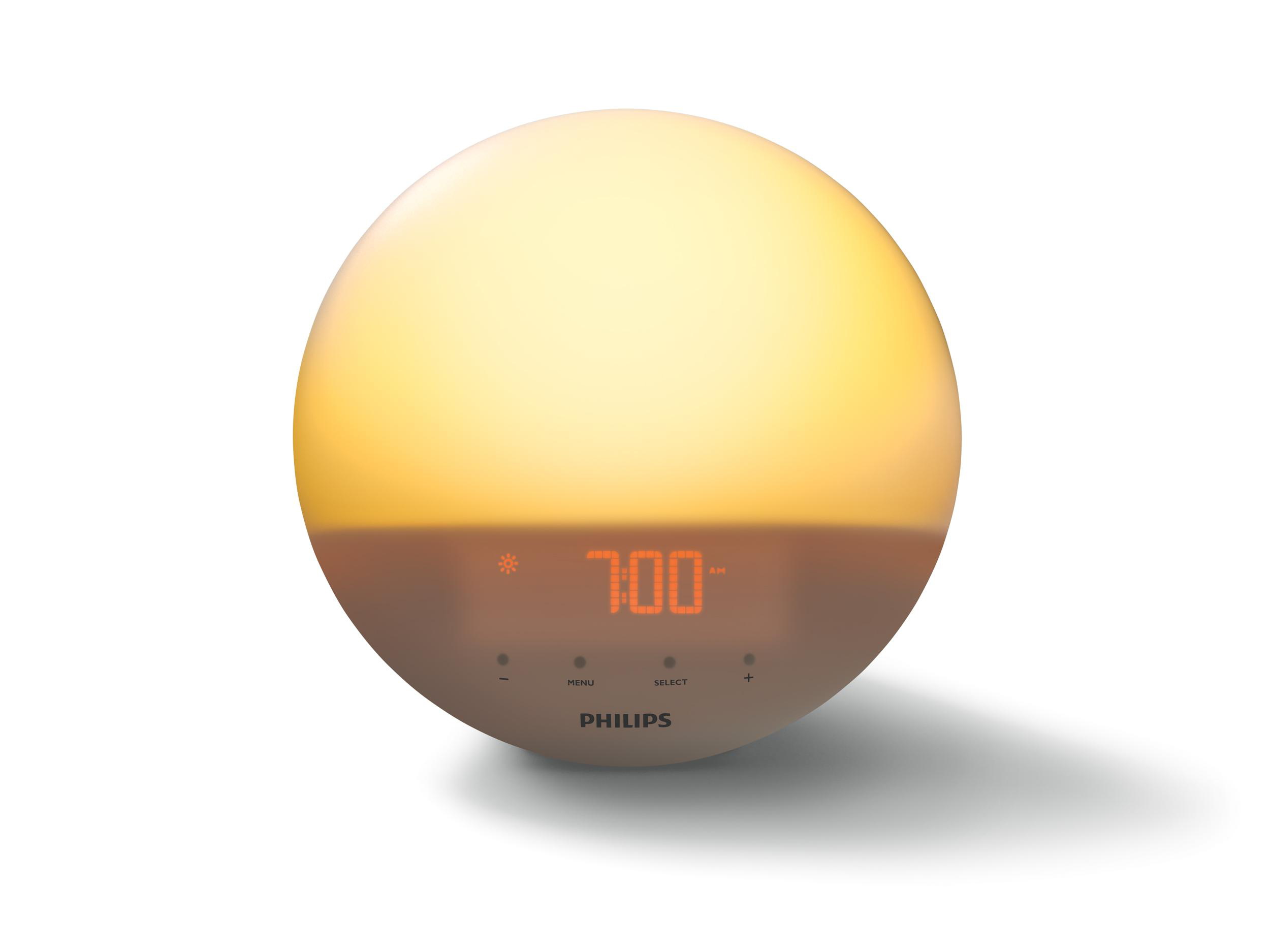 Philips Wecker mit rundem Design, zeigt 7:00. Die Uhr steht auf Weiß. Es hat ein gelbes Leuchten.