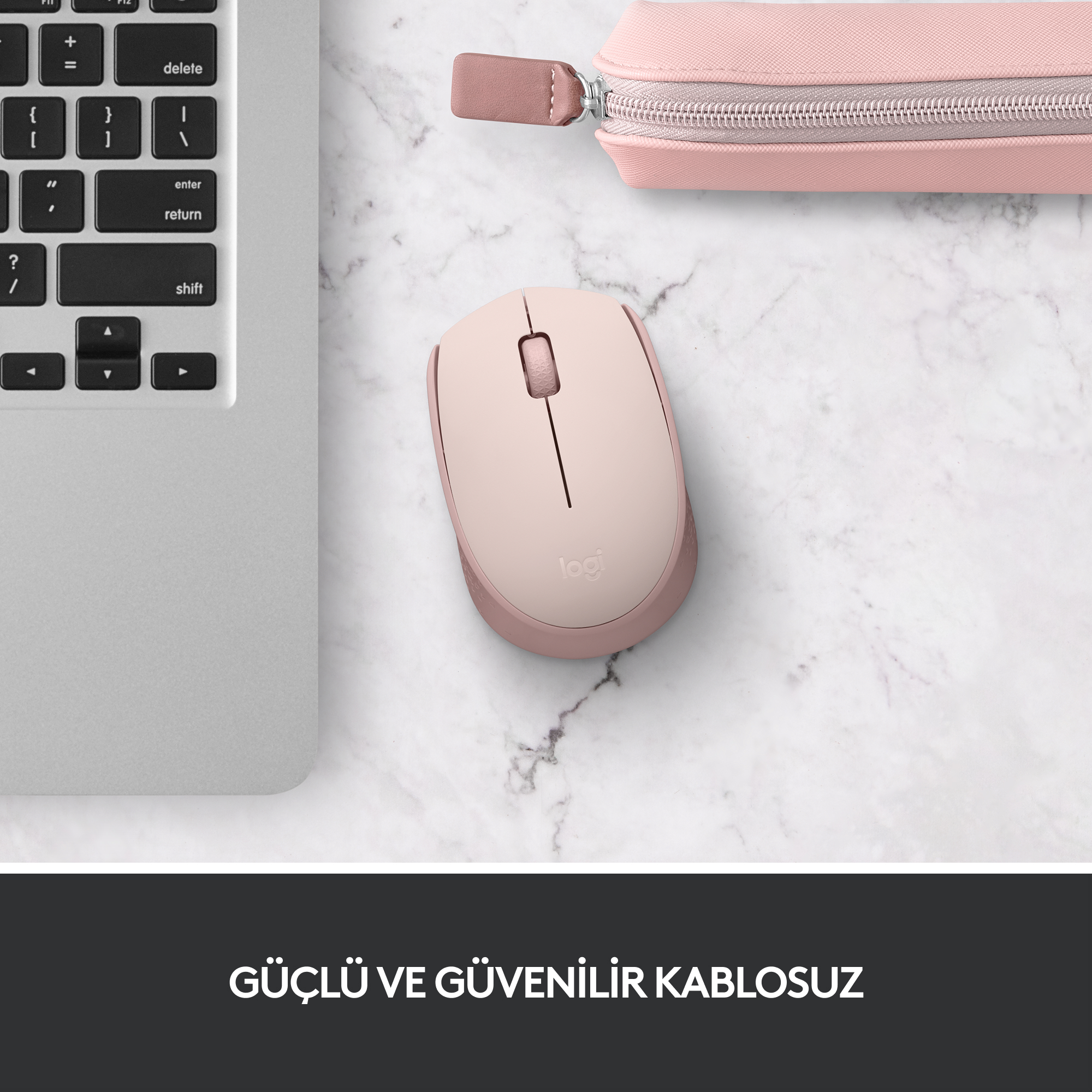 Mermer üzerinde pembe fare ve kalem kutusu. Klavye görünür. Metin: GÜÇLÜ VE GÜVENİLİR KABLOSUZ.