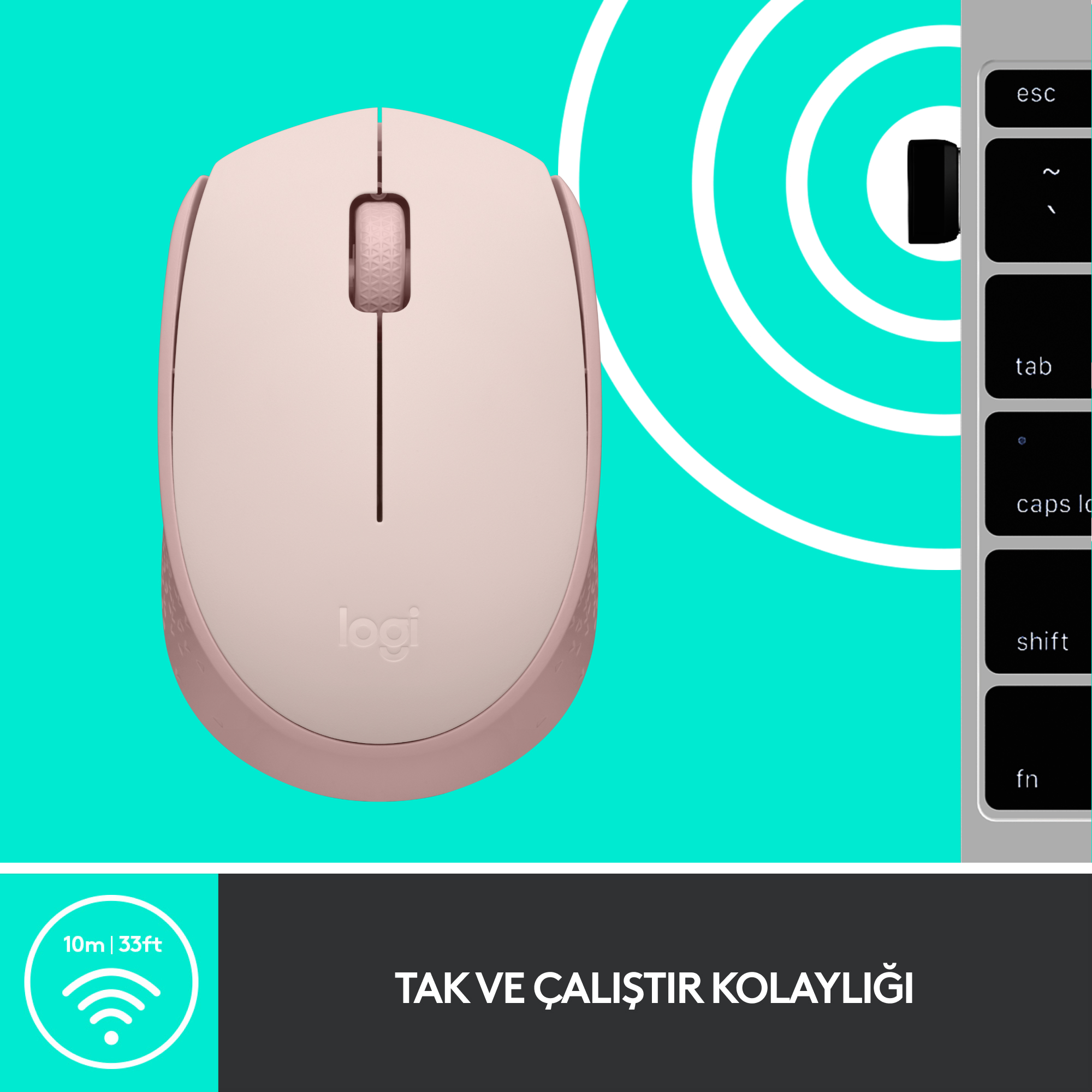 Teal yüzeyde bir klavyenin yanında pembe kablosuz fare.