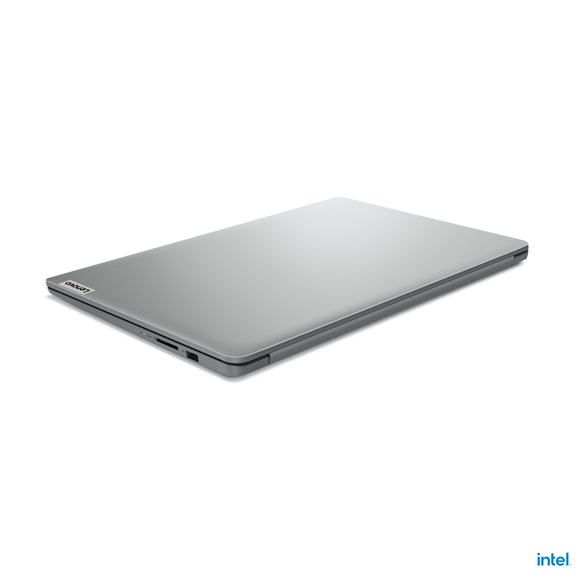 Ein geschlossenes silbernes Lenovo-Laptop vor weißem Hintergrund. Das Intel-Logo ist sichtbar.