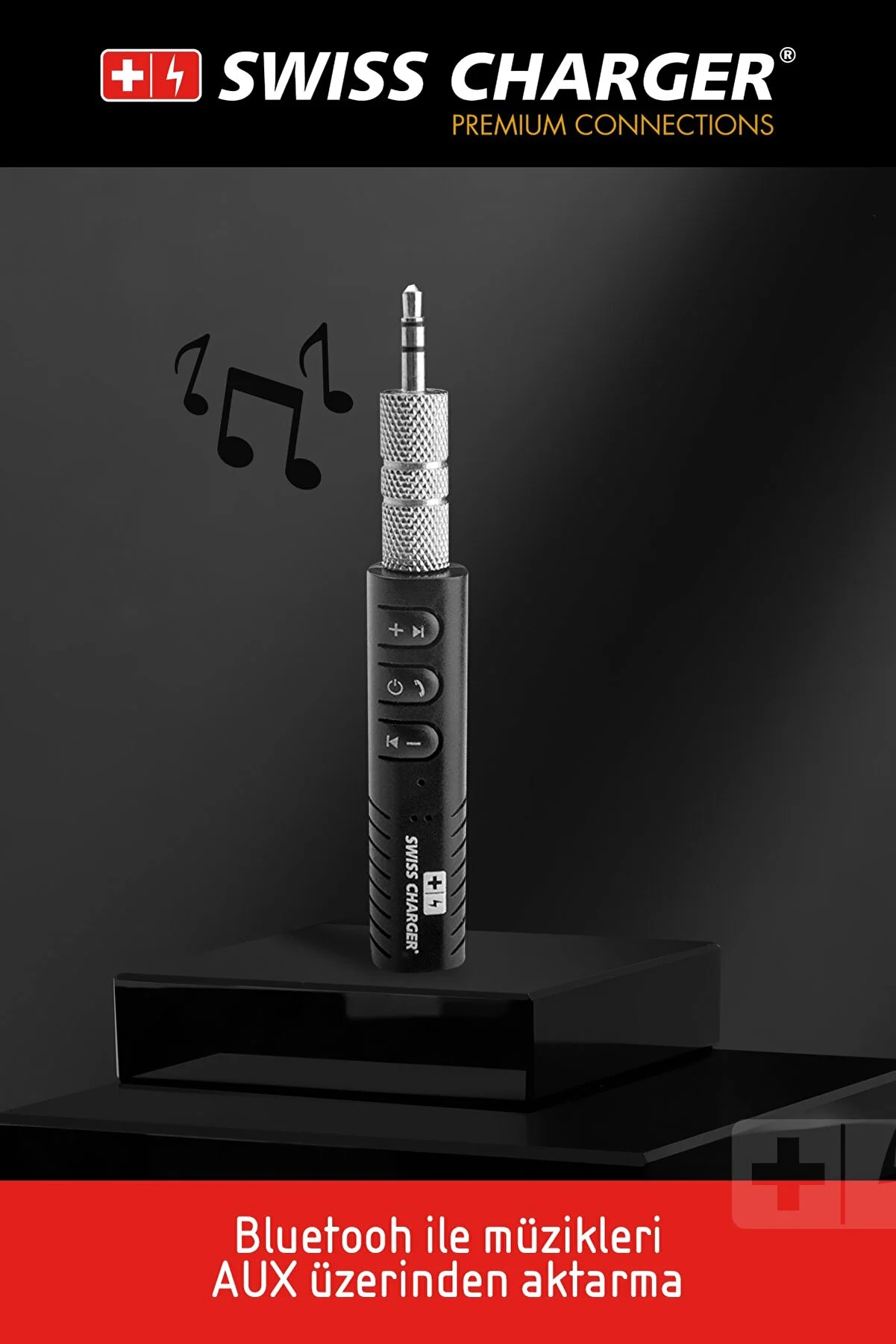 Gümüş detaylara sahip siyah Bluetooth ses alıcısı. Siyah bir tabanı var.