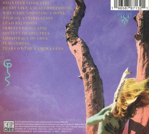 Albumcover mit Texten, einer Person mit Maske und Ästen. Das Album heißt Secret Tree.