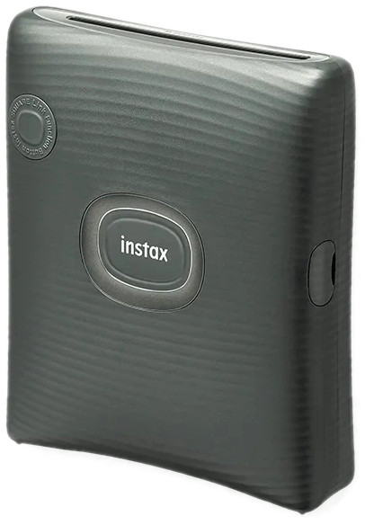 A dark gray Instax camera, compact and rectangular.