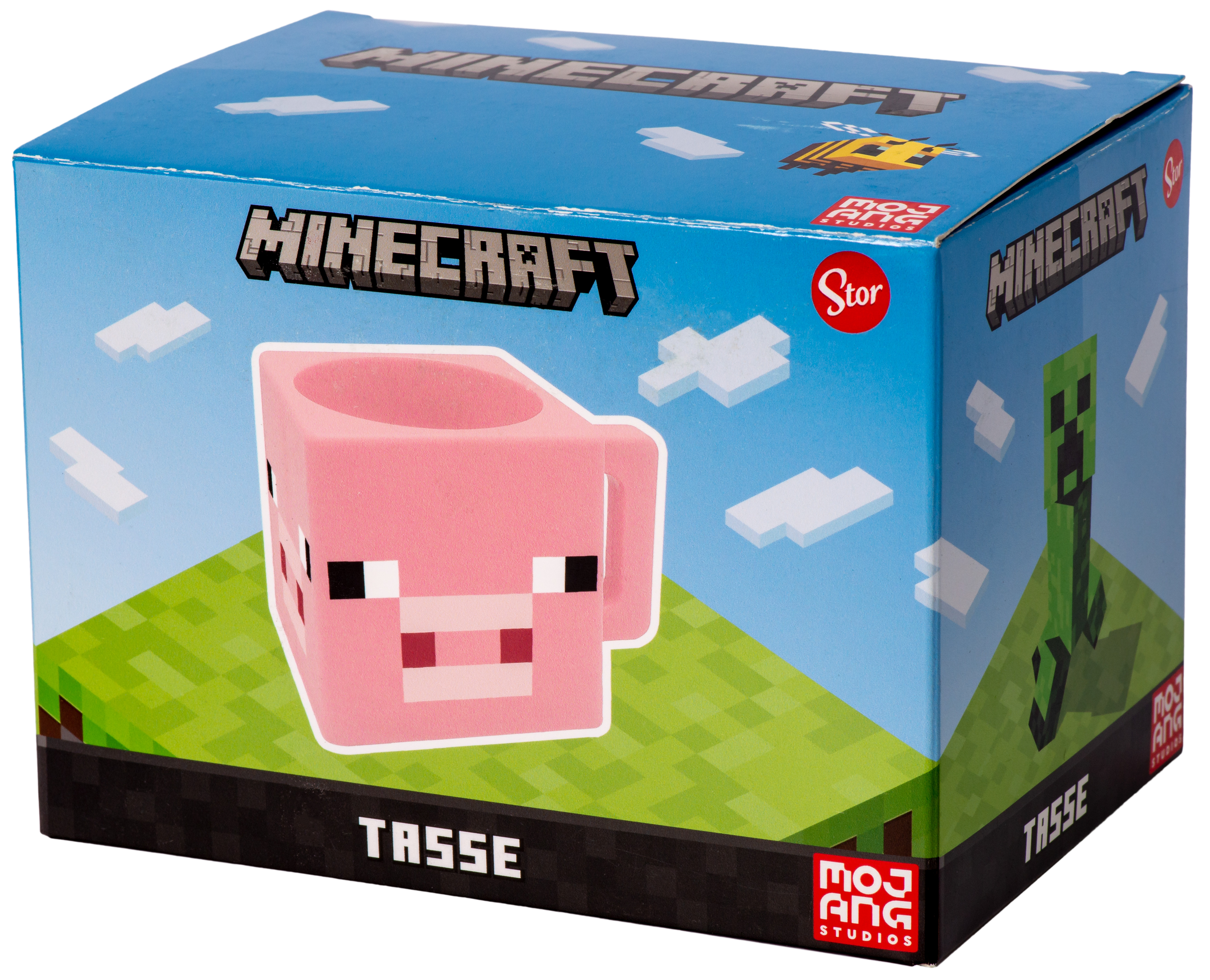 Eine Minecraft-Tasse in Schweineform auf einer Minecraft-Themenbox mit einem Creeper und einer Biene.