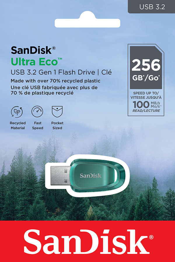 A SanDisk USB drive in packaging. It's green with a white logo and text about recycled material.