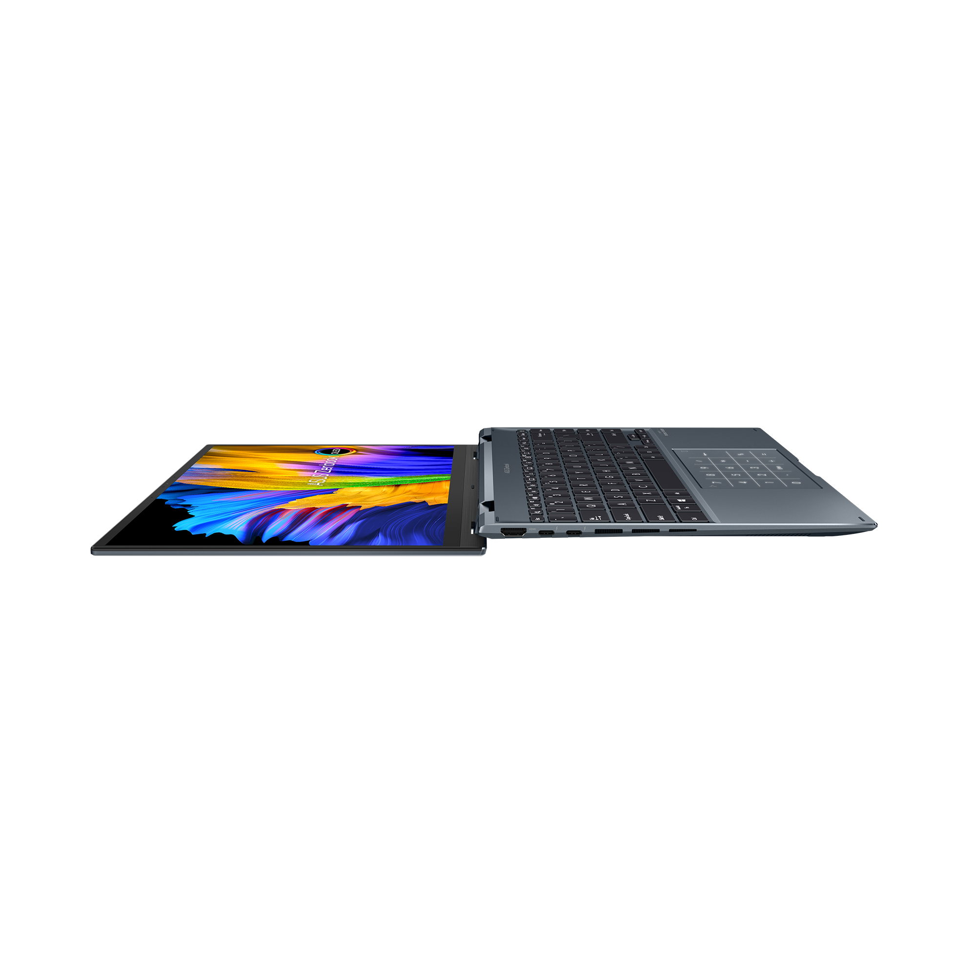 Ordenador portátil con pantalla abierta y teclado. La pantalla muestra arte abstracto colorido.