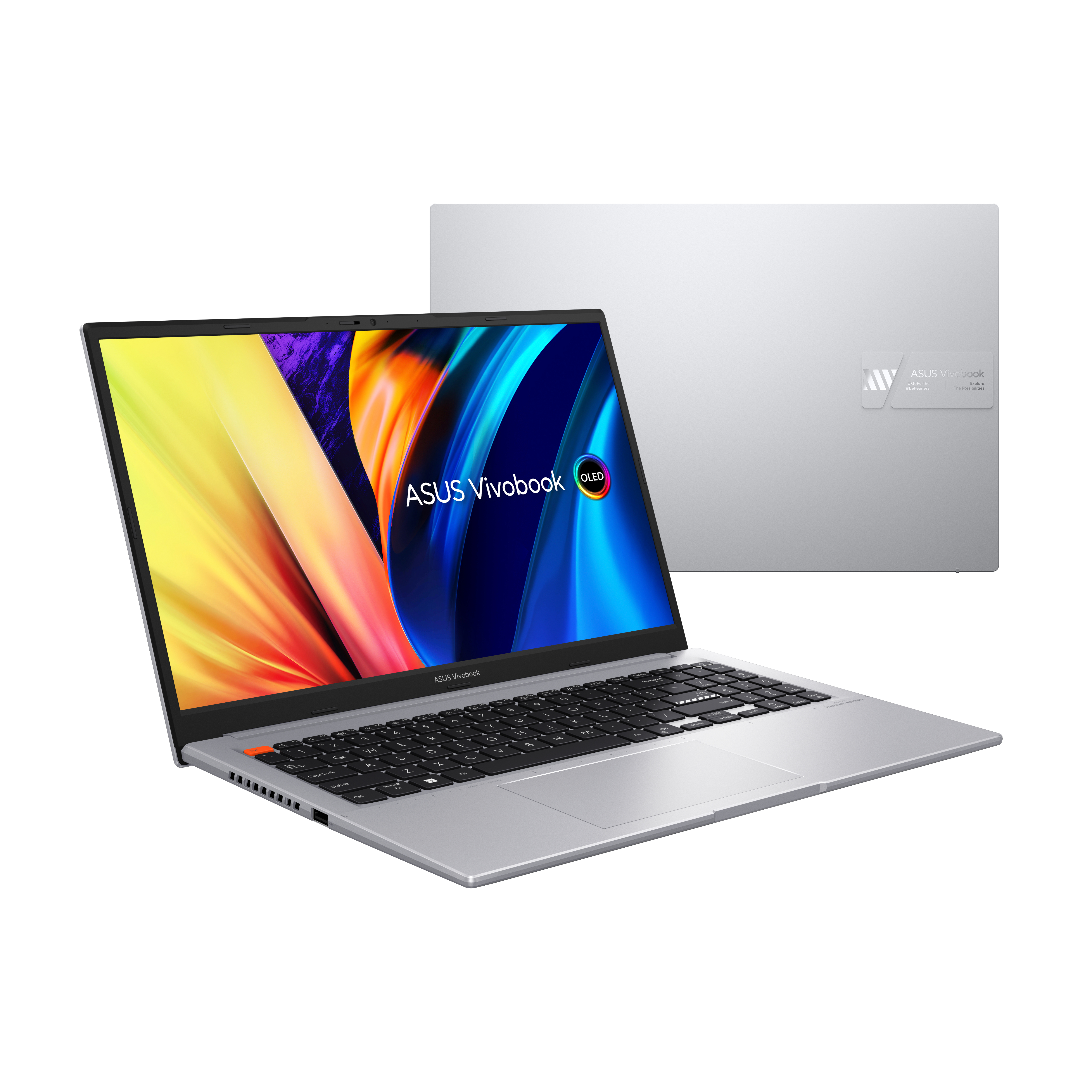 Laptop plateado con pantalla colorida mostrando ASUS Vivobook. La parte trasera y pantalla del portátil son visibles.
