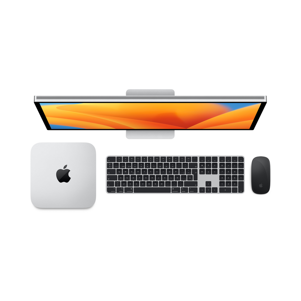 Configuración de ordenador: monitor, Mac mini, teclado y ratón, vista cenital.