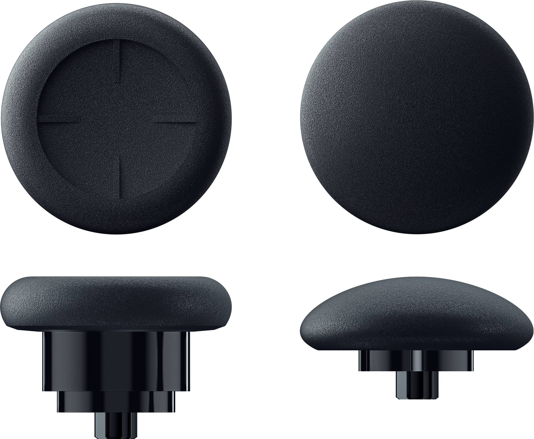 Vier schwarze Joystick-Daumengriffe, verschiedene Ansichten, zeigen Kreuzschraffur und strukturierte Oberfläche.