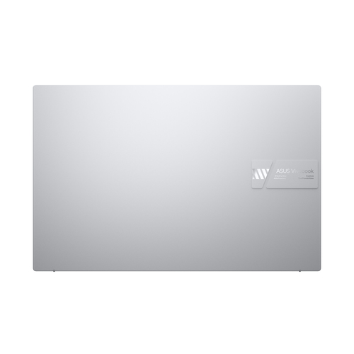 Laptop Asus Vivobook plateado, con la parte trasera mirando al espectador y el logo de la marca.
