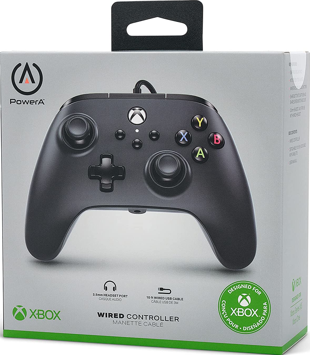 Manette Xbox filaire noire dans sa boîte, avec des boutons et un câble.