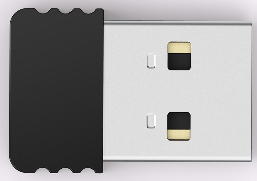Een zwarte USB-stick met een zilveren connector. De weergave is van bovenaf.