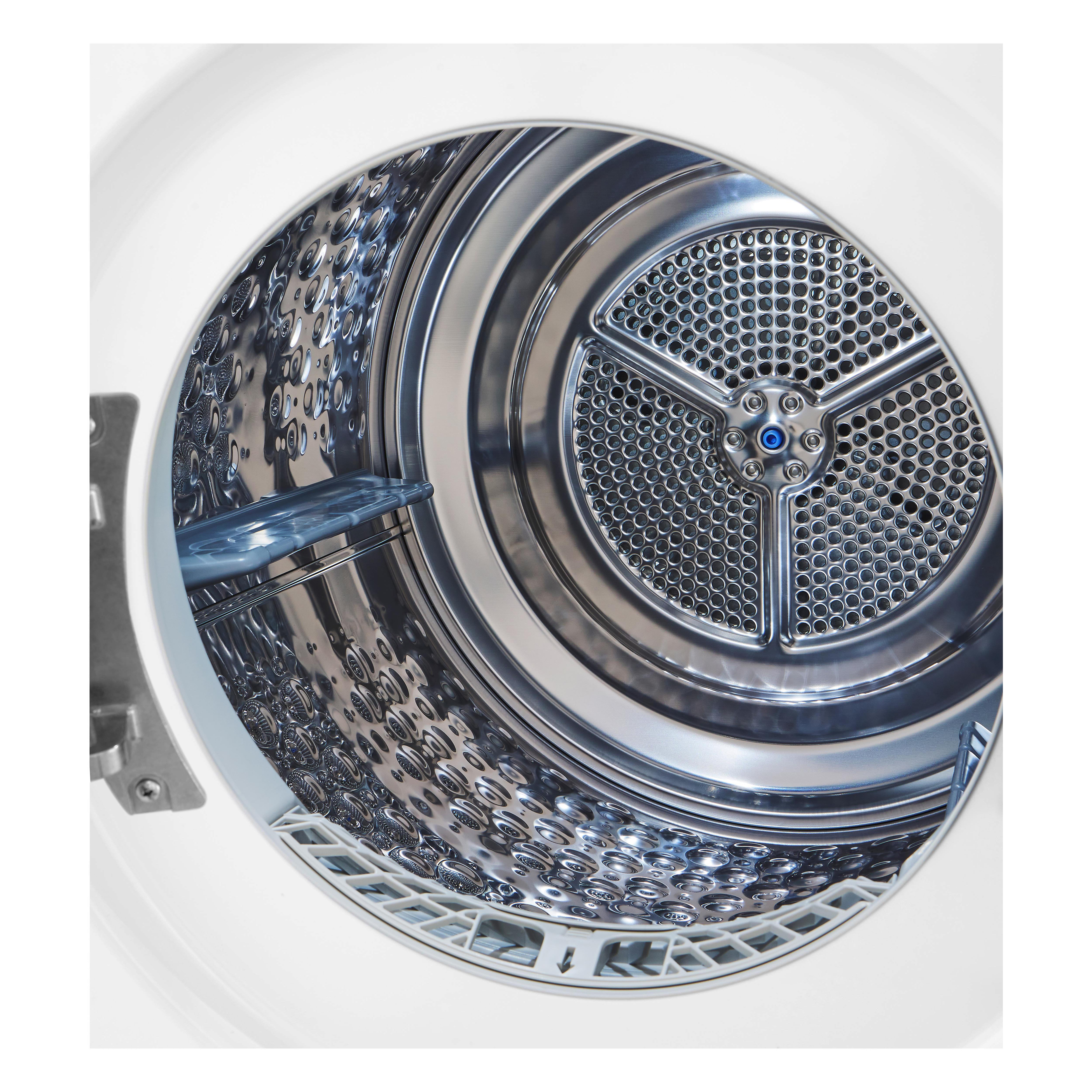 Innenseite eines Trockners, sauber und metallisch, mit Drehtrommel.