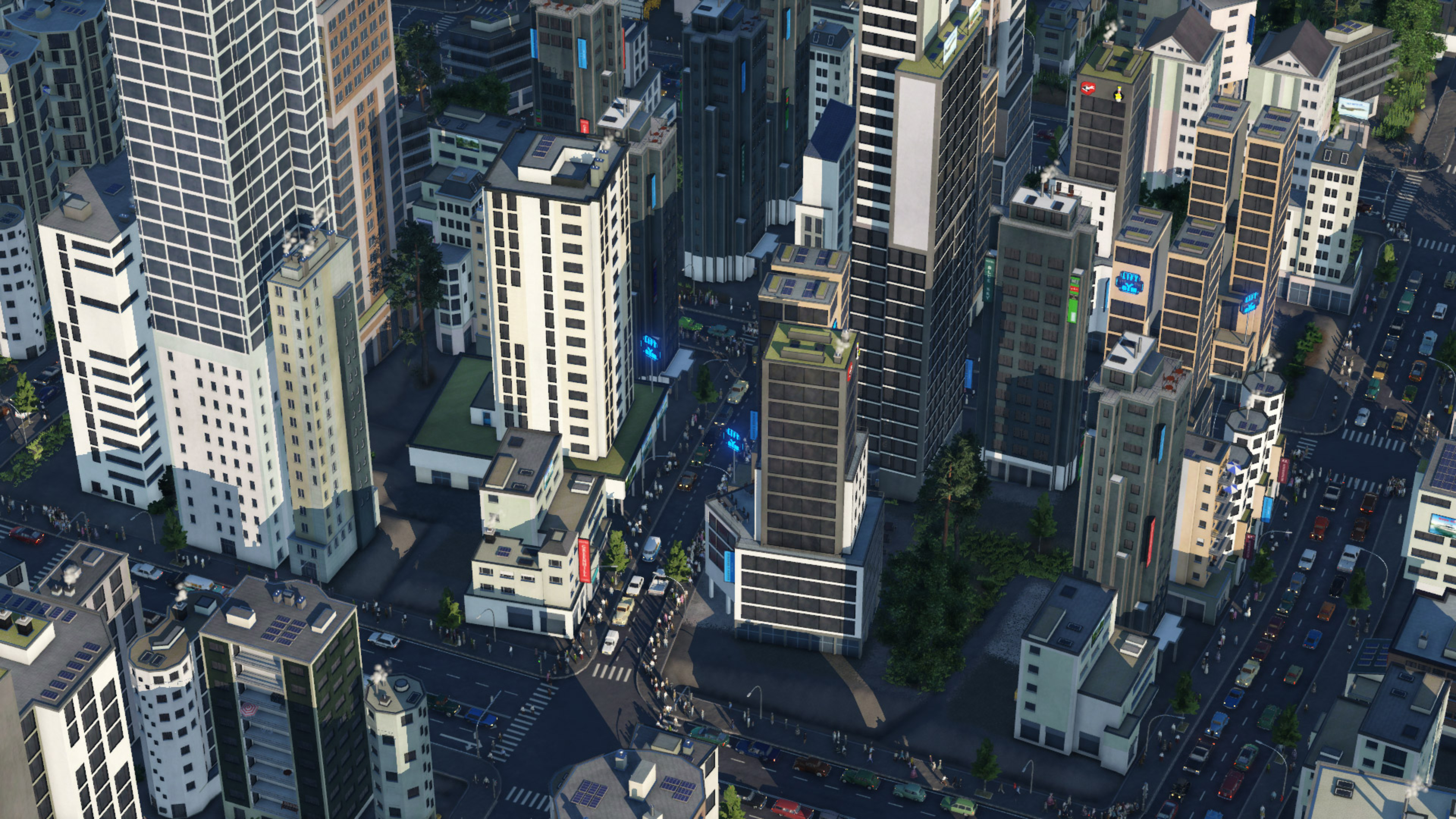 Eine Luftaufnahme einer modernen Stadt mit hohen Gebäuden, Straßen und Verkehr.