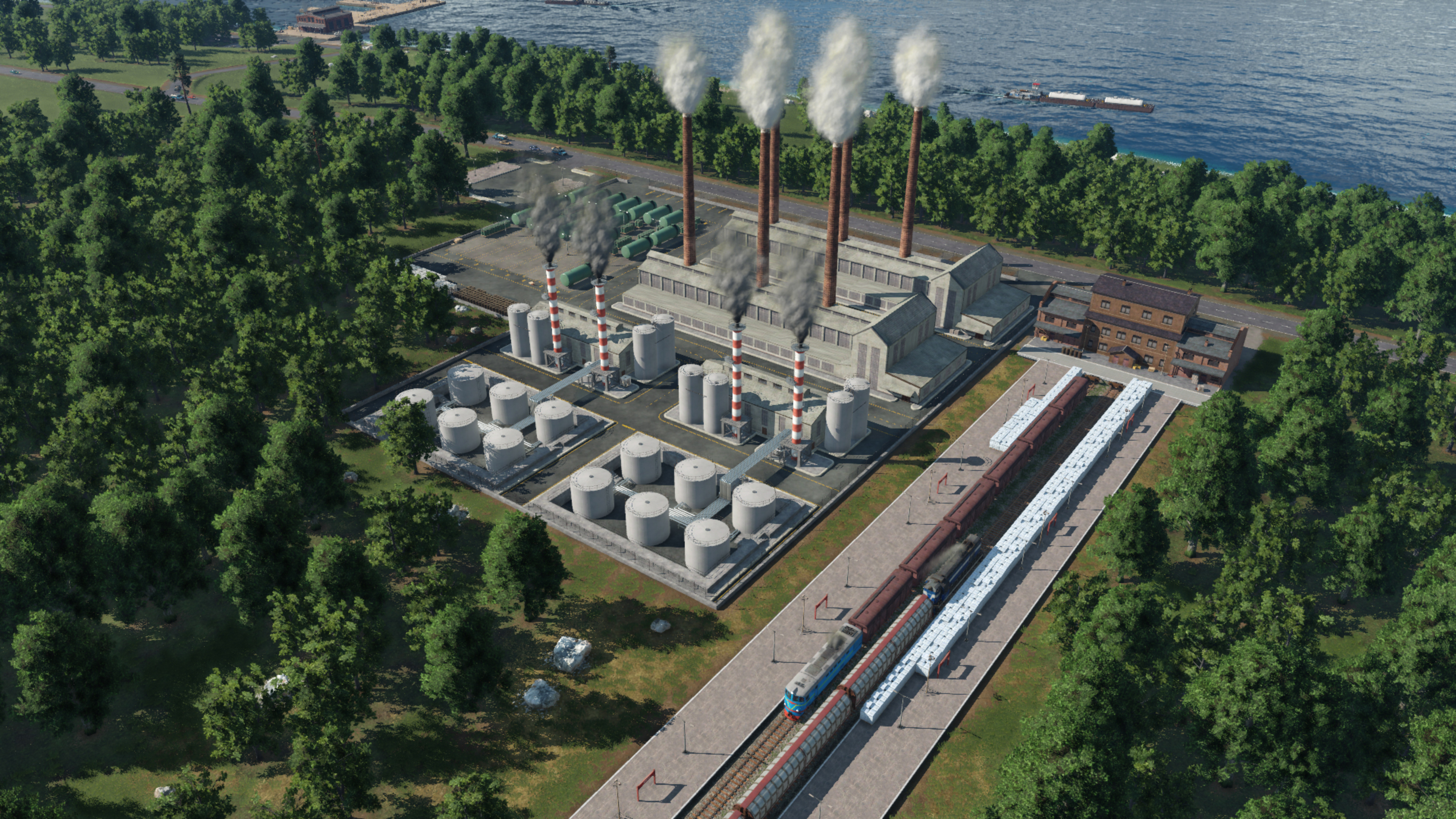 Eine digitale Illustration einer Fabrik mit Schornsteinen und einem Bahnhof.