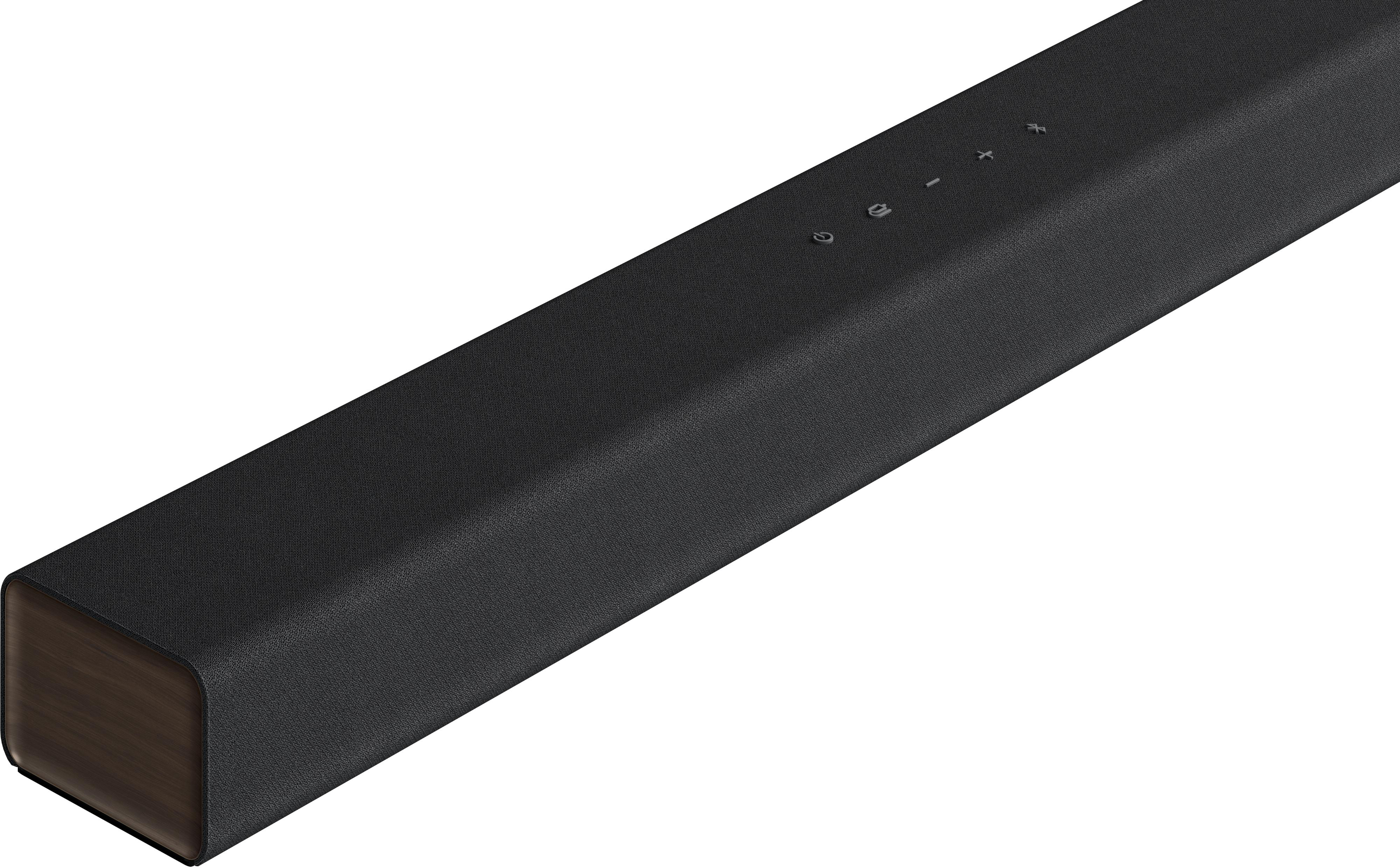 Nahaufnahme einer schwarzen Soundbar mit Holzende, Tasten oben.