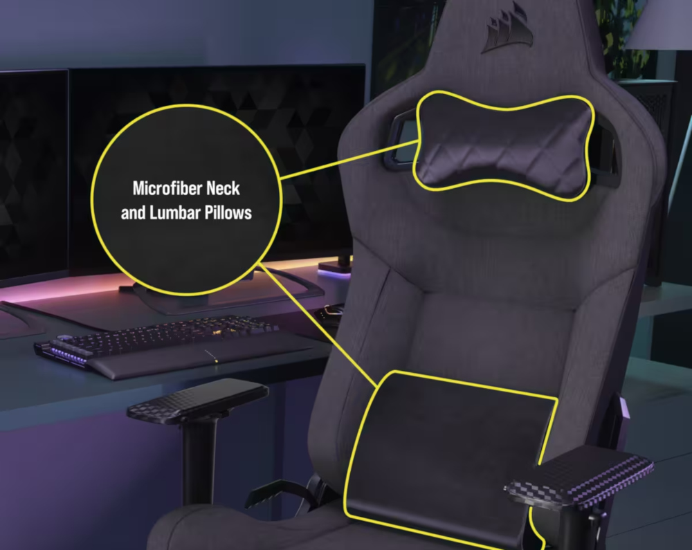 Black gaming chair with yellow highlighted microfiber neck and lumbar pillows.