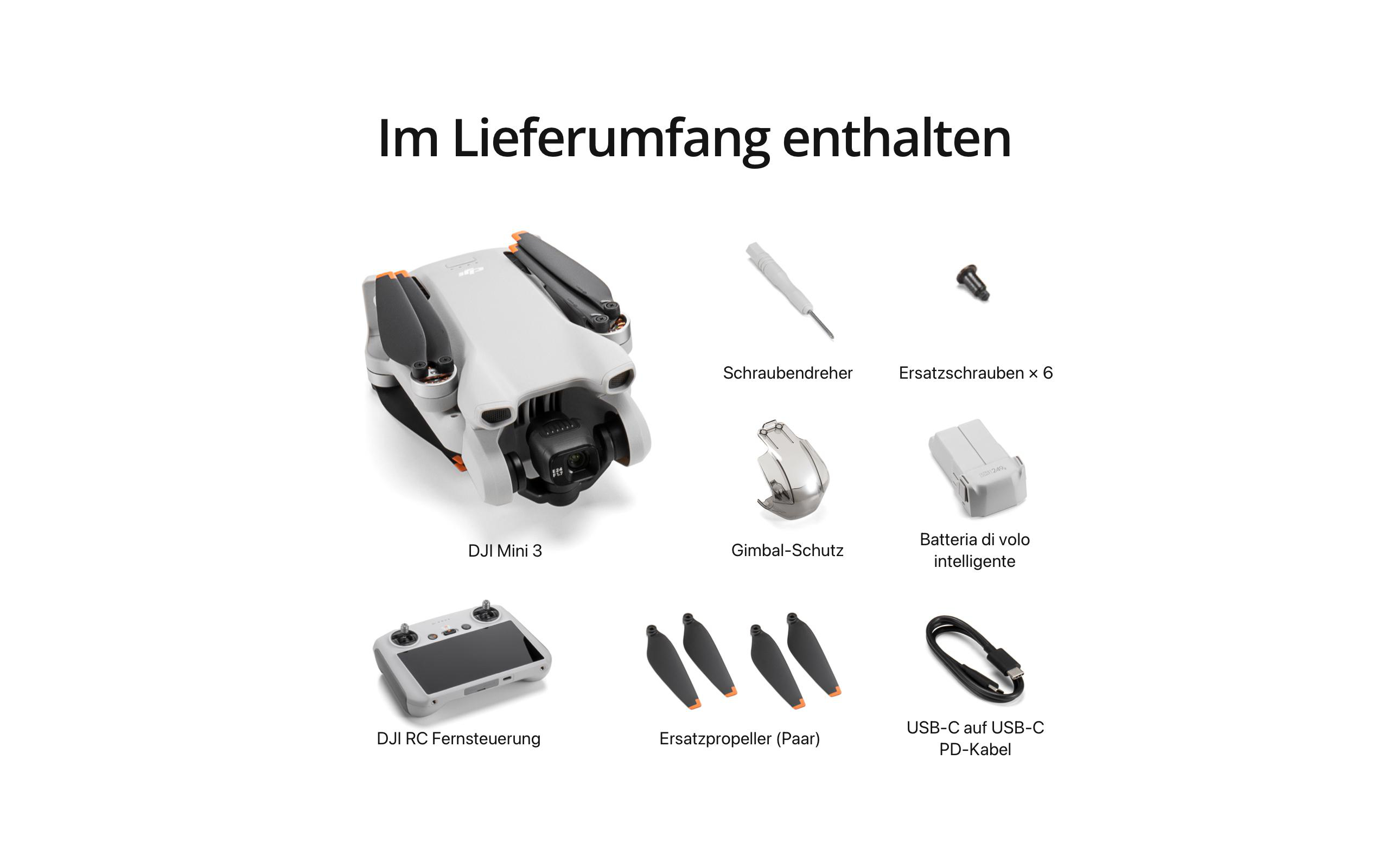 Eine weiße DJI Mini 3 Drohne und ihr Zubehör, einschließlich Fernbedienung, Propeller und Akku.