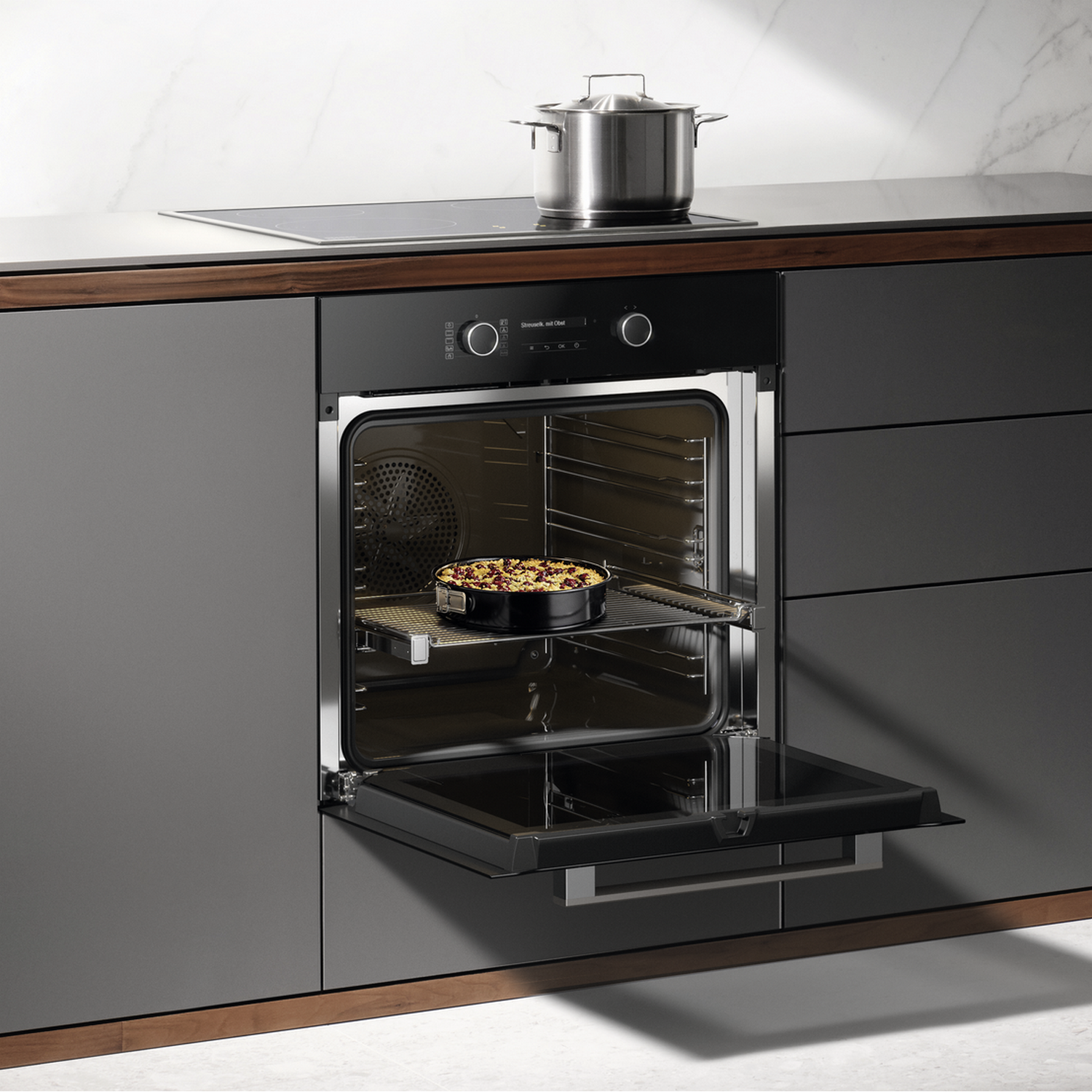 An oven with a pie inside. The oven door is open. The background is a kitchen.
