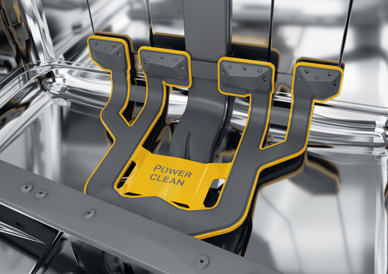 Mosogatógép Power Clean funkciójának közeli képe. Sárga és szürke műanyag alkatrészek.