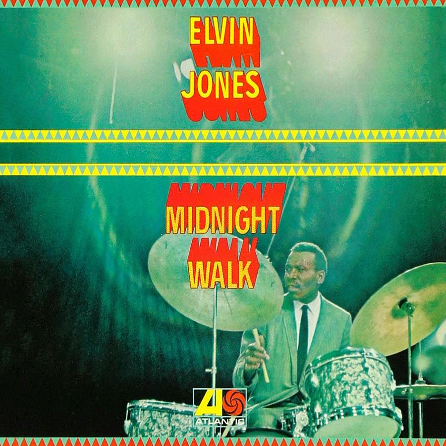 Elvin Jones album borító, Midnight Walk. Egy férfi dobol zöld háttér előtt.