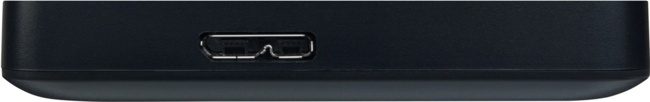 Un dispositivo negro y rectangular con un puerto USB en su lateral se muestra en un primer plano.