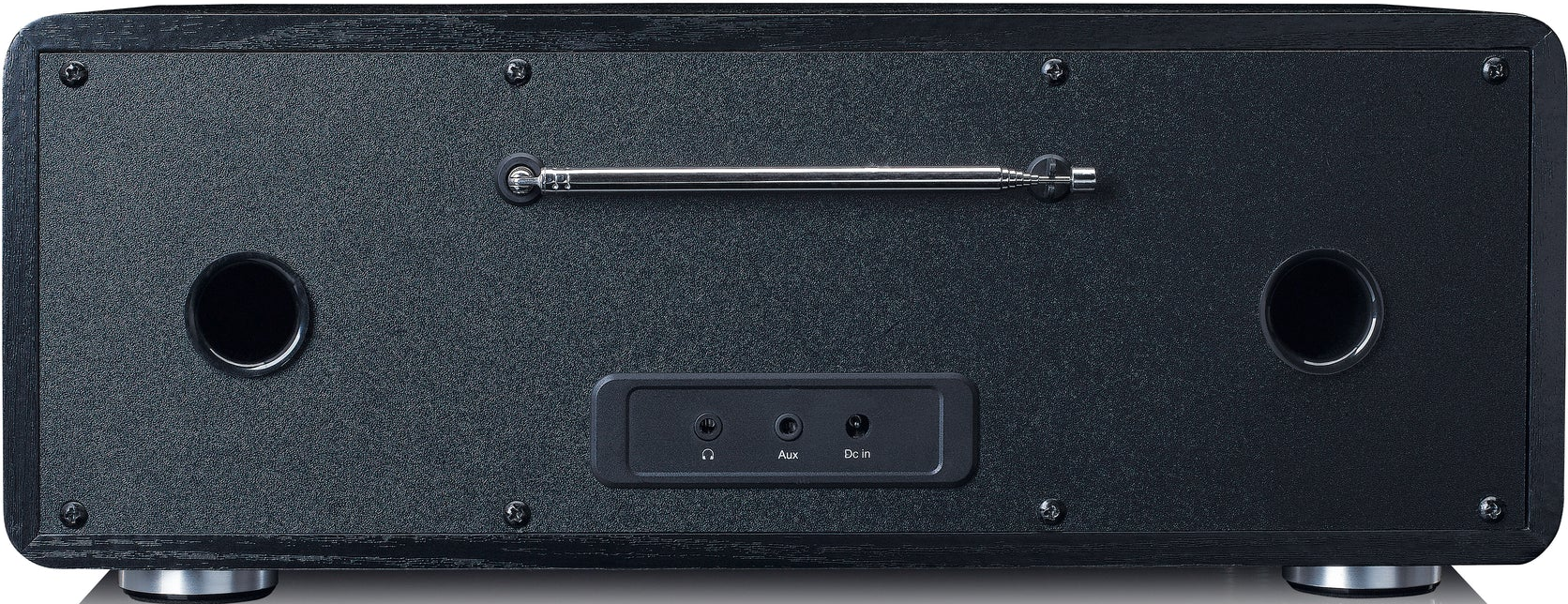 Rückseite eines schwarzen Holzradios. Antenne und Anschlüsse sind sichtbar.