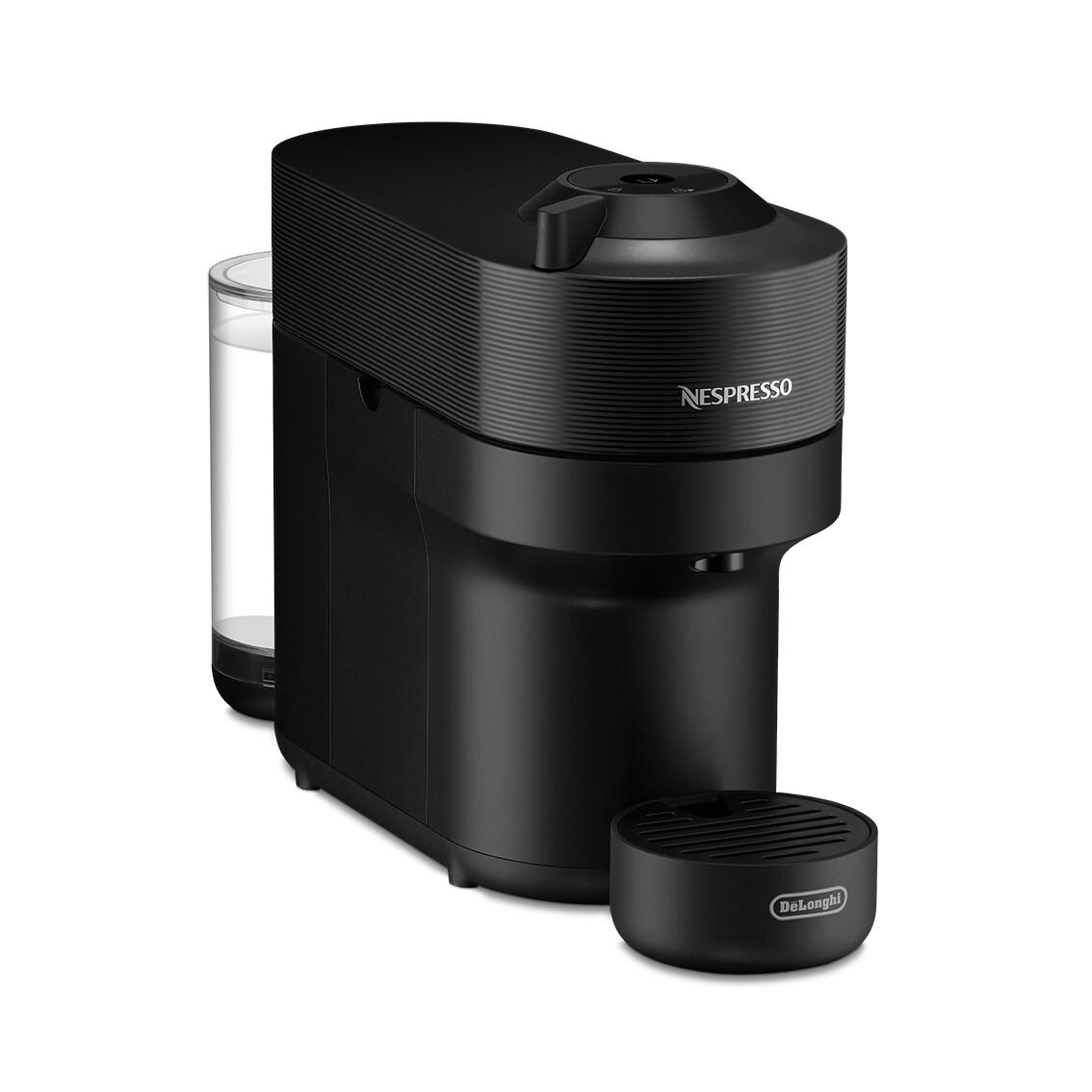 Eine schwarze Nespresso-Kaffeemaschine mit einem Wasserbehälter an der Seite und einem Delonghi-Sockel.