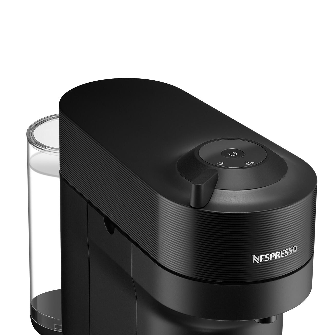 Schwarze Nespresso-Kaffeemaschine. Ein Wasserbehälter ist sichtbar. Drei Knöpfe.