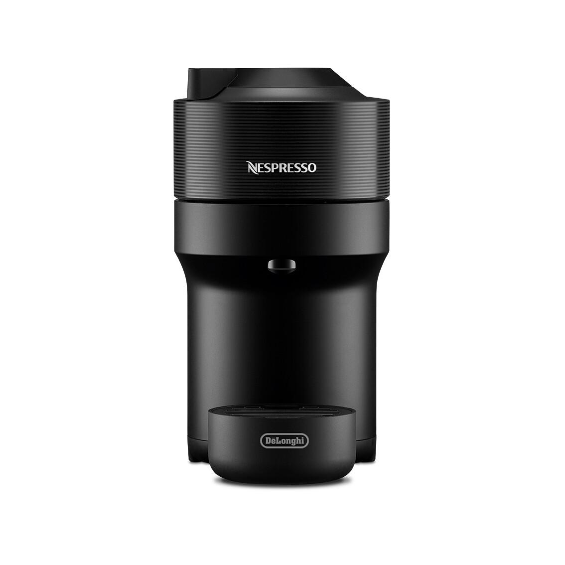 Eine schwarze Nespresso-Kaffeemaschine mit einem Sockel der Marke Delonghi.