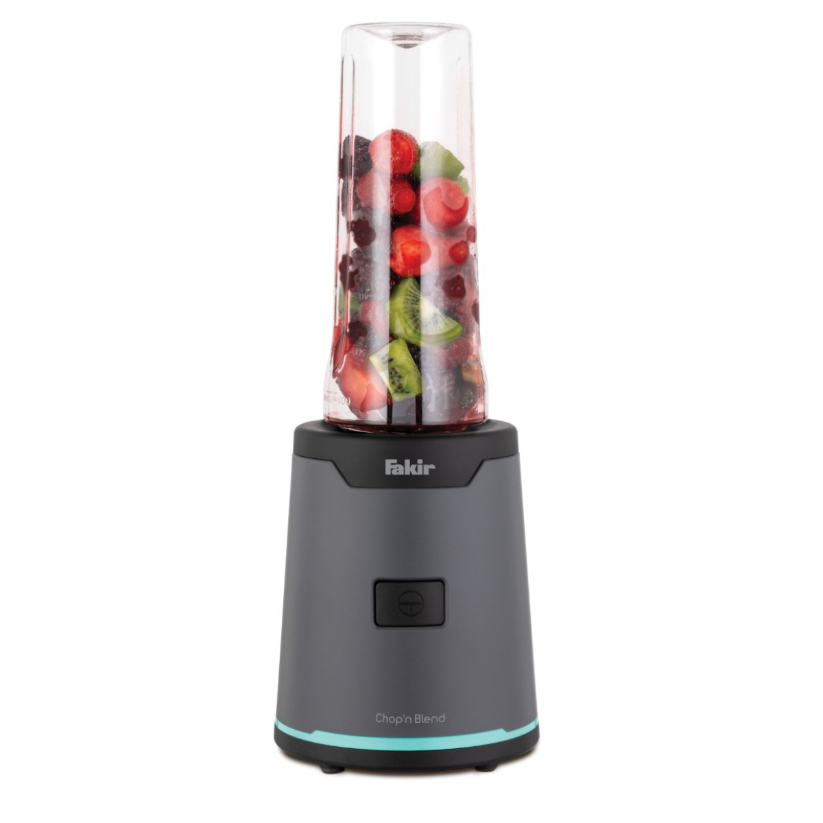 Karışık meyveli bir blender. Taban koyu gri, kavanoz şeffaf ve meyveler kırmızı ve yeşil.