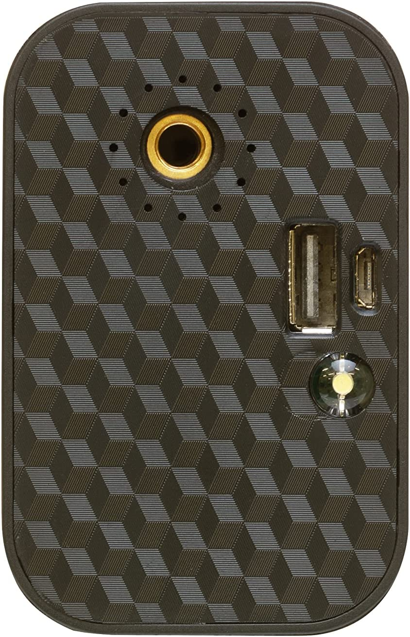 Parte trasera de dispositivo tecnológico negro con patrón geométrico, cámara, puertos y luz verde redonda.