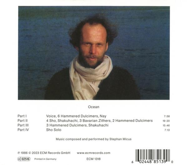 Albumcover mit dem Gesicht eines Mannes, Text und blauem Hintergrund mit dem Ozean.