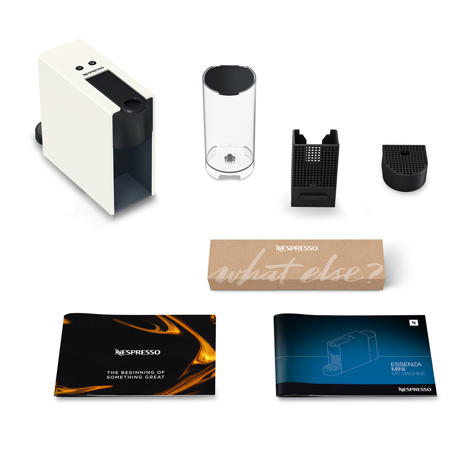 Macchina Nespresso e accessori: serbatoio dell'acqua, porta capsule e manuali.